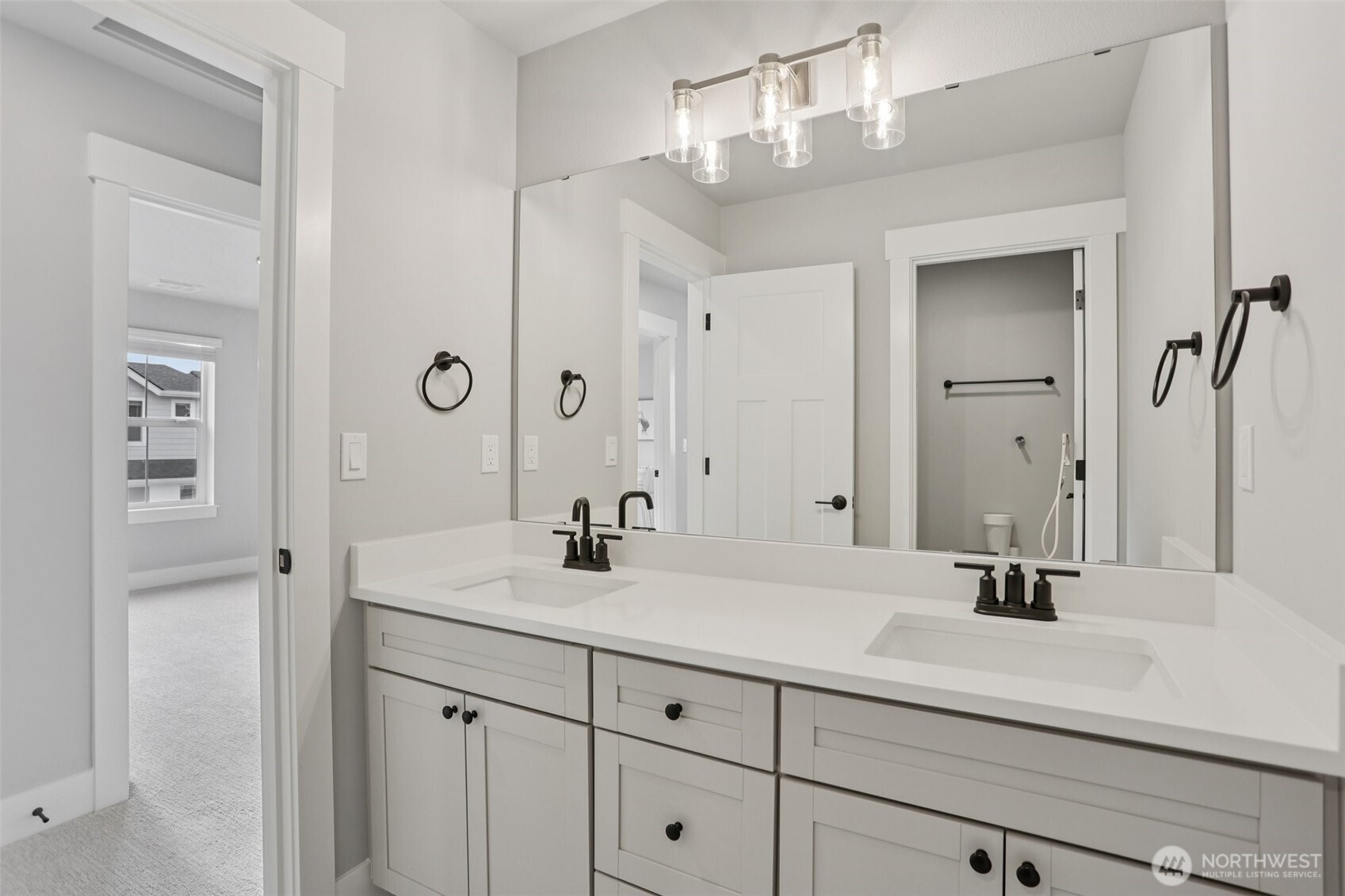 15 160th Place Southeast Bothell, WA 98012 - Photo 28 of 36 a bathroom with a sink and a mirror