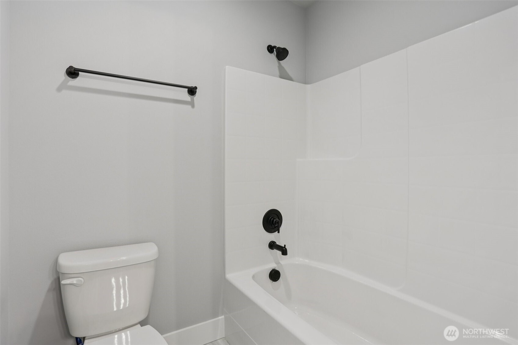 15 160th Place Southeast Bothell, WA 98012 - Photo 29 of 36 a bathroom with a toilet and a bathtub