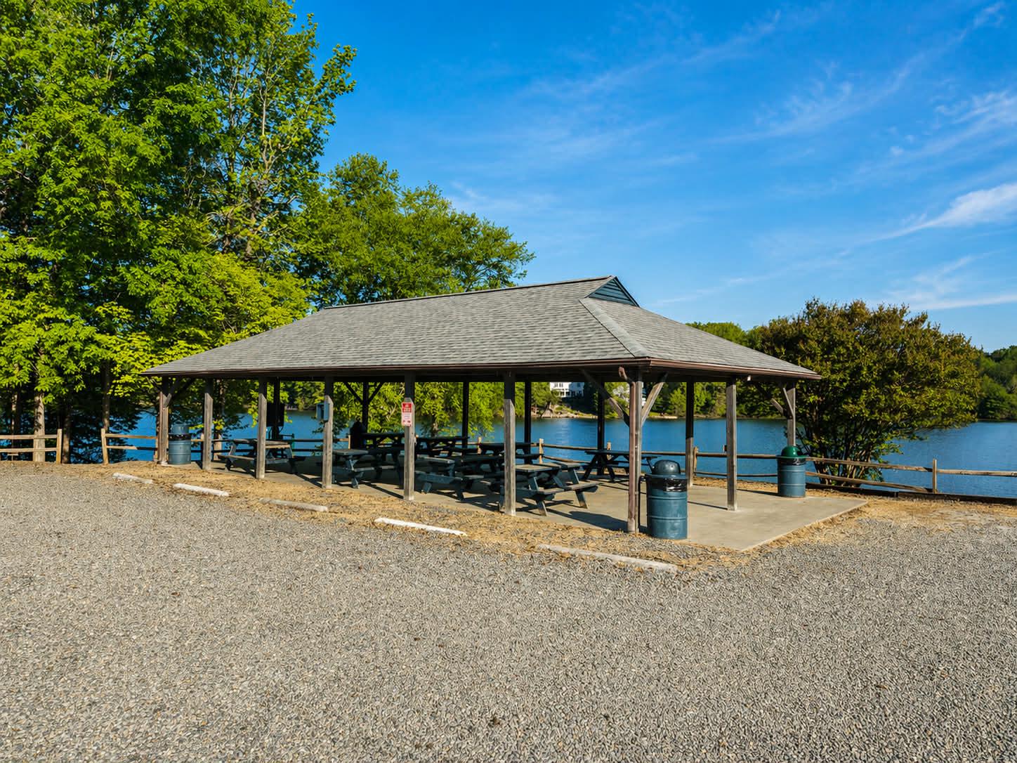 118 Ackerman Lane Ruther Glen, VA 22546 - Photo 52 of 57 a backyard of a house with barbeque oven table and chairs