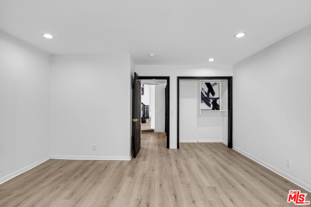 19668 Pine Valley Way Porter Ranch, CA 91326 - Photo 20 of 52 a view of a livingroom with wooden floor