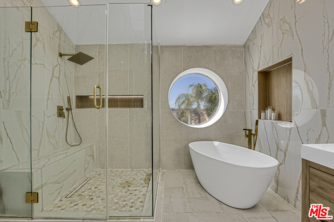 19668 Pine Valley Way Porter Ranch, CA 91326 - Photo 28 of 52 a bathroom with a toilet and a shower