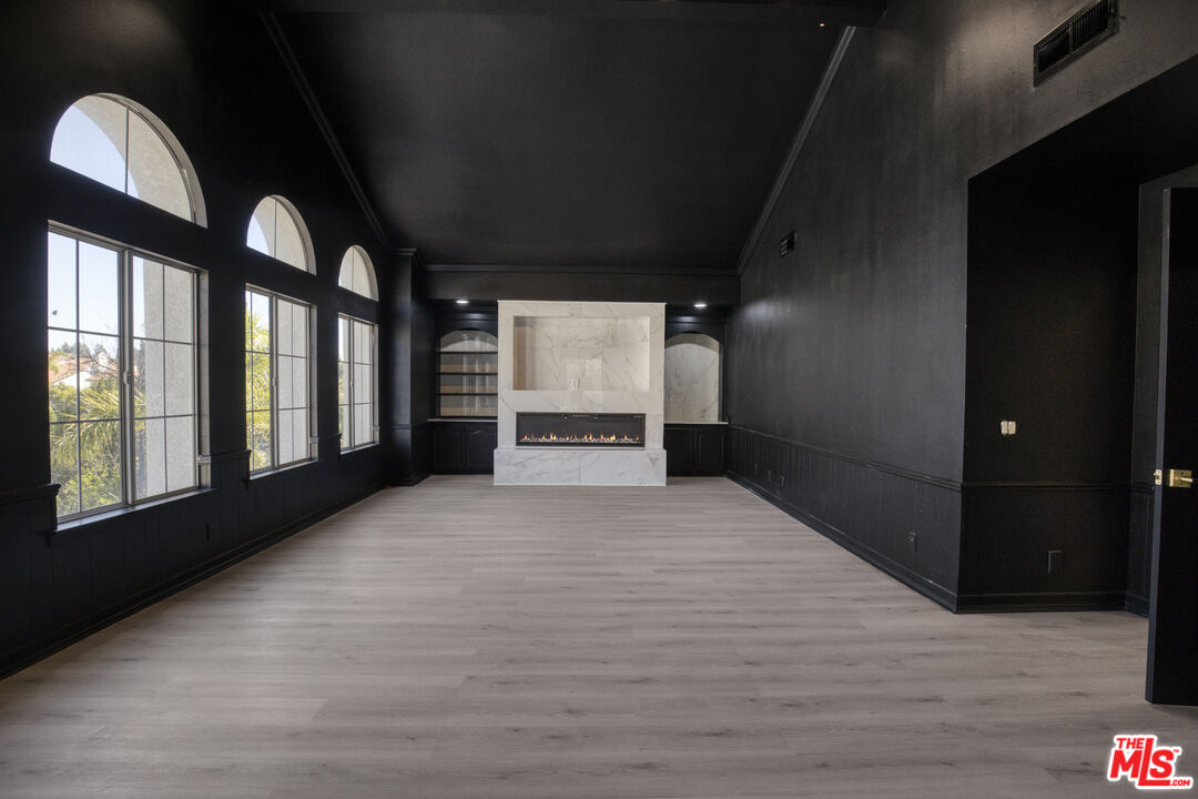 19668 Pine Valley Way Porter Ranch, CA 91326 - Photo 34 of 52 a view of an empty room with a window