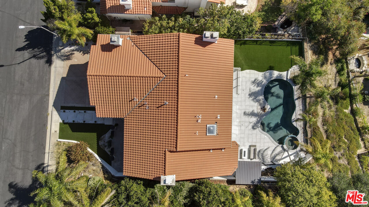 19668 Pine Valley Way Porter Ranch, CA 91326 - Photo 46 of 52 a aerial view of a house with a yard