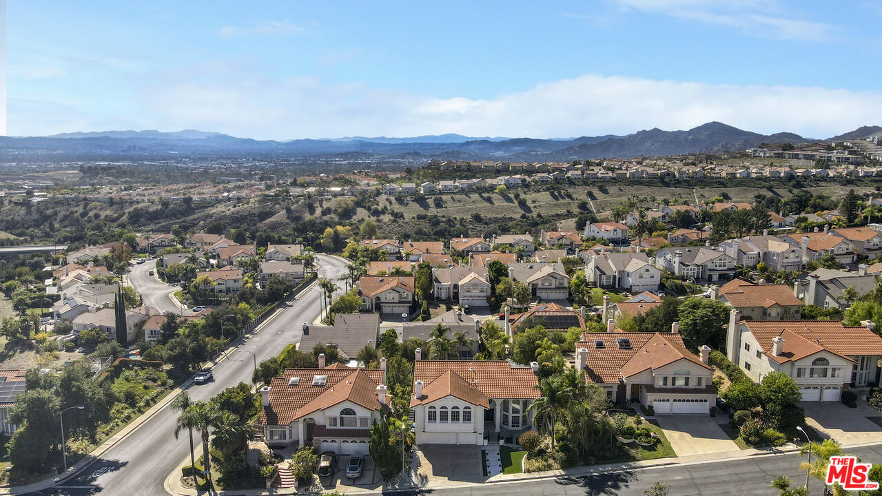 19668 Pine Valley Way Porter Ranch, CA 91326 - Photo 47 of 52 an aerial view of residential houses and street