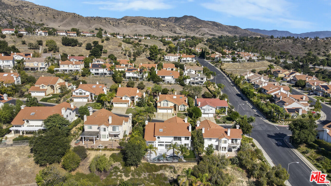 19668 Pine Valley Way Porter Ranch, CA 91326 - Photo 48 of 52 an aerial view of residential houses with outdoor space