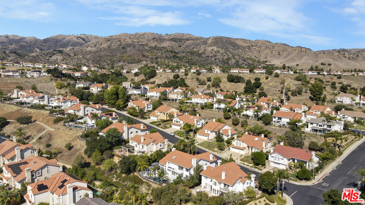 19668 Pine Valley Way Porter Ranch, CA 91326 - Photo 49 of 52 an aerial view of residential houses with city view