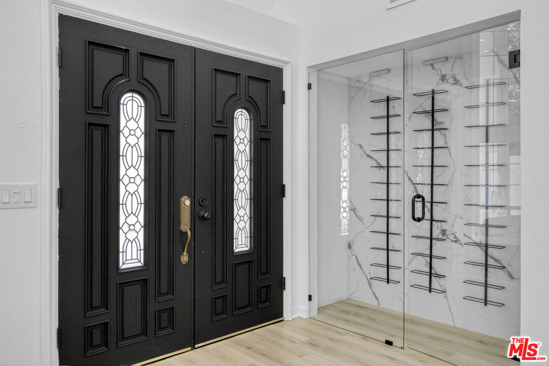 19668 Pine Valley Way Porter Ranch, CA 91326 - Photo 6 of 52 a view of a bathroom with a shower