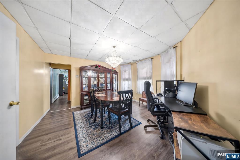 409 Hamilton Street Harrison, NJ 07029 - Photo 23 of 44 a workspace with furniture and wooden floor