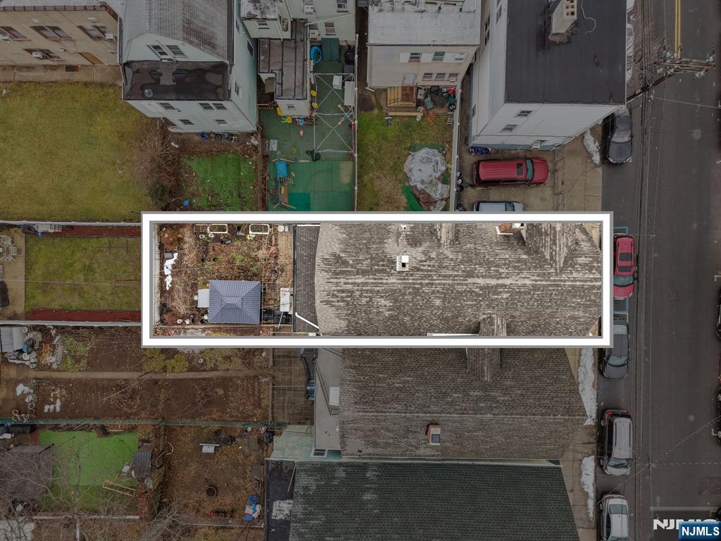 409 Hamilton Street Harrison, NJ 07029 - Photo 41 of 44 a view of swimming pool with a yard