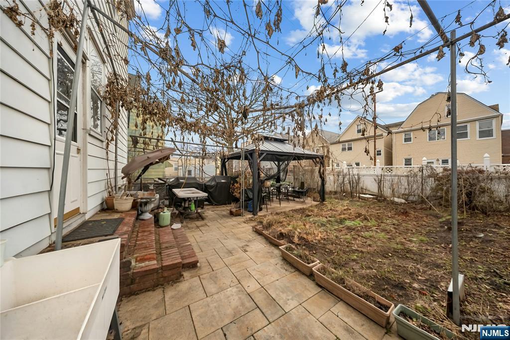 409 Hamilton Street Harrison, NJ 07029 - Photo 43 of 44 a view of a backyard of the house