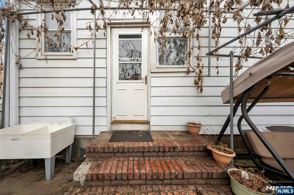 409 Hamilton Street Harrison, NJ 07029 - Photo 44 of 44 a view of entryway with a front door
