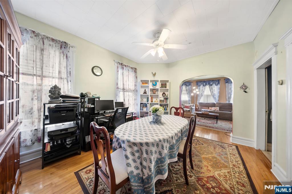 409 Hamilton Street Harrison, NJ 07029 - Photo 9 of 44 a view of a dining room with furniture window and wooden floor