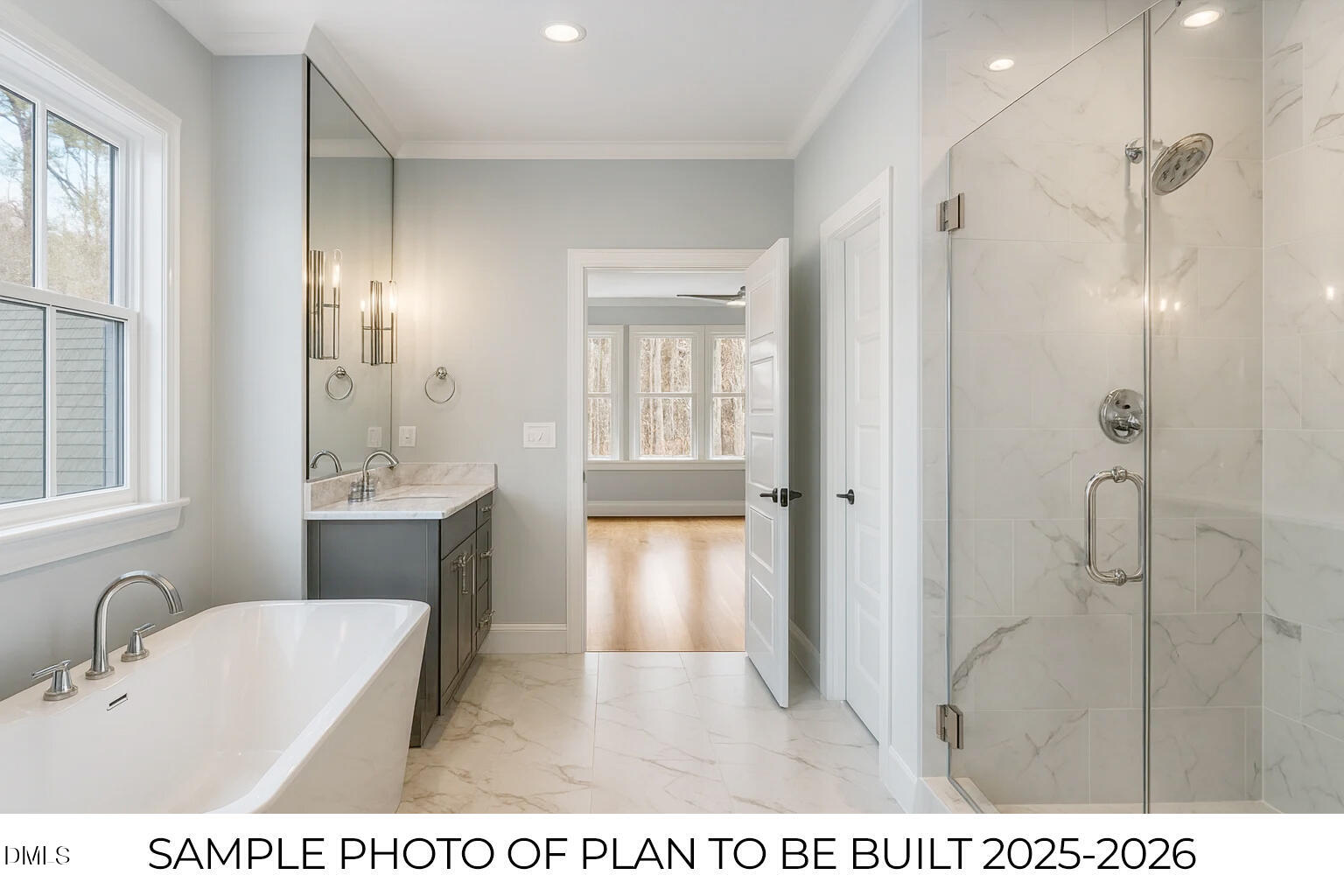 819 Homestead Road Chapel Hill, NC 27516 - Photo 12 of 28 a bathroom with a tub a sink and a large mirror