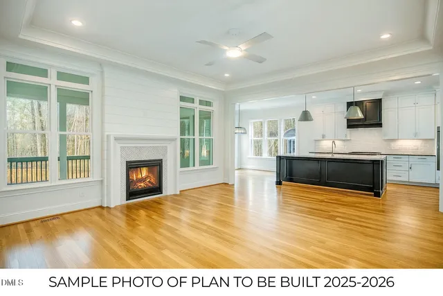 a view of kitchen with furniture and fireplace