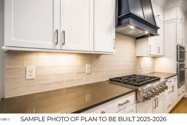 a kitchen with cabinets and appliances