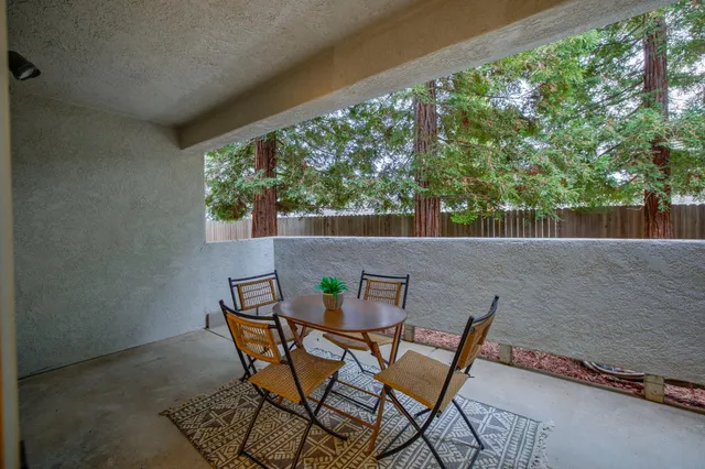 a view of an outdoor space with furniture