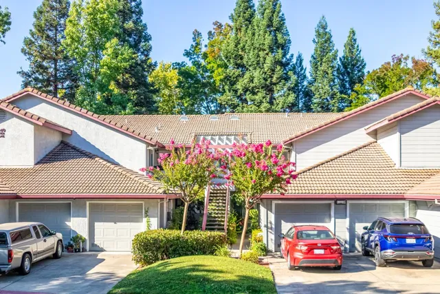 a house view with a garden space