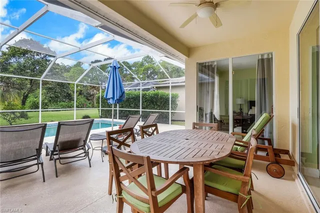a view of an outdoor space with a table and chairs