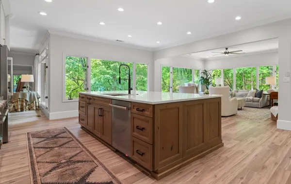 a view of a kitchen cabinets and a stove