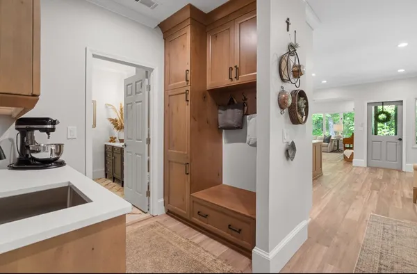 a bathroom with a tub shower and window