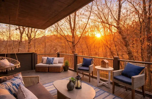 a outdoor living space with patio furniture and a potted plant