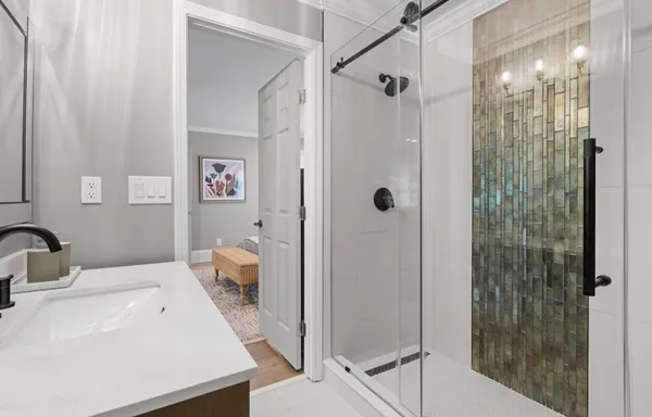 a balcony with furniture and wooden floor