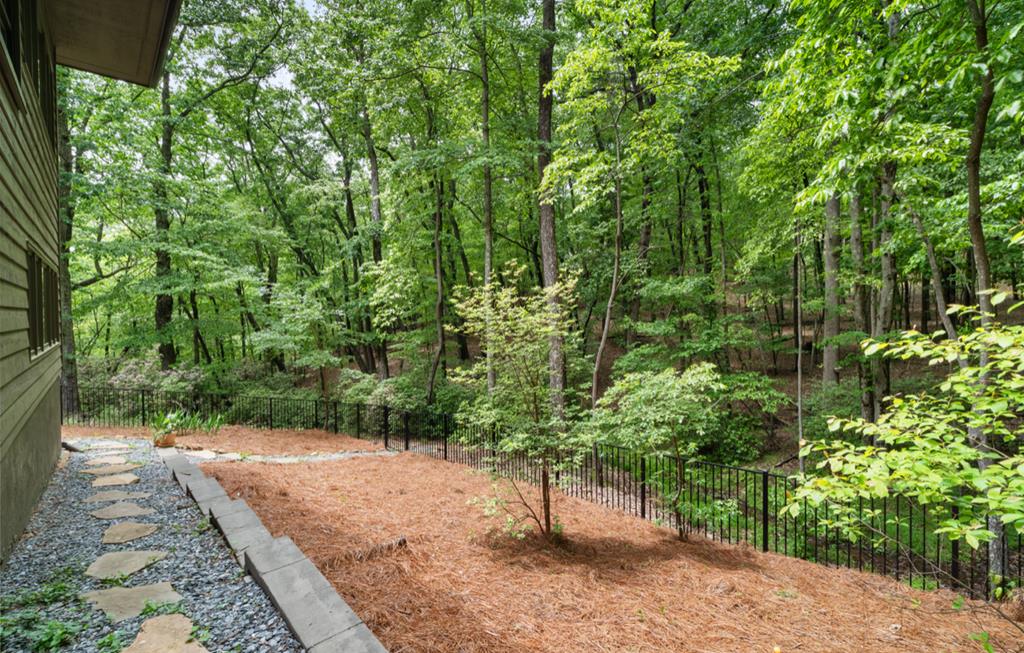 220 Wake Robin Drive Jasper, GA 30143 - Photo 66 of 81 a view of a yard with plants and large trees