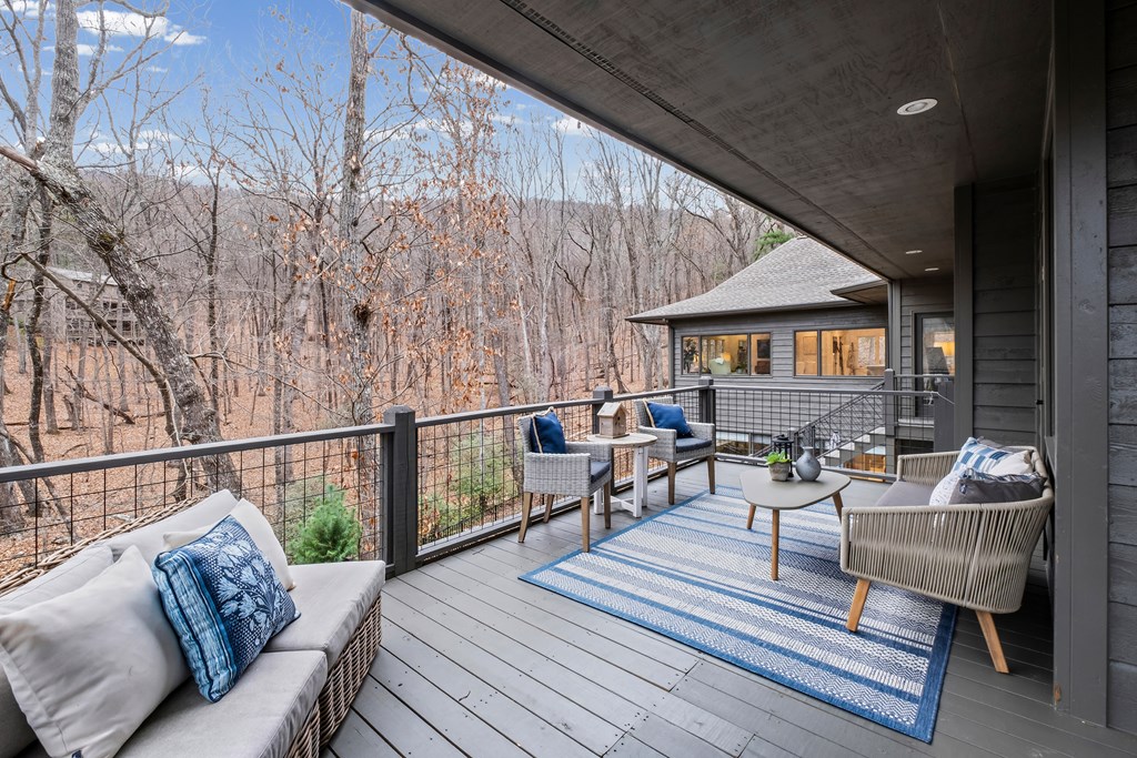 220 Wake Robin Drive Jasper, GA 30143 - Photo 70 of 81 a balcony with furniture and wooden floor