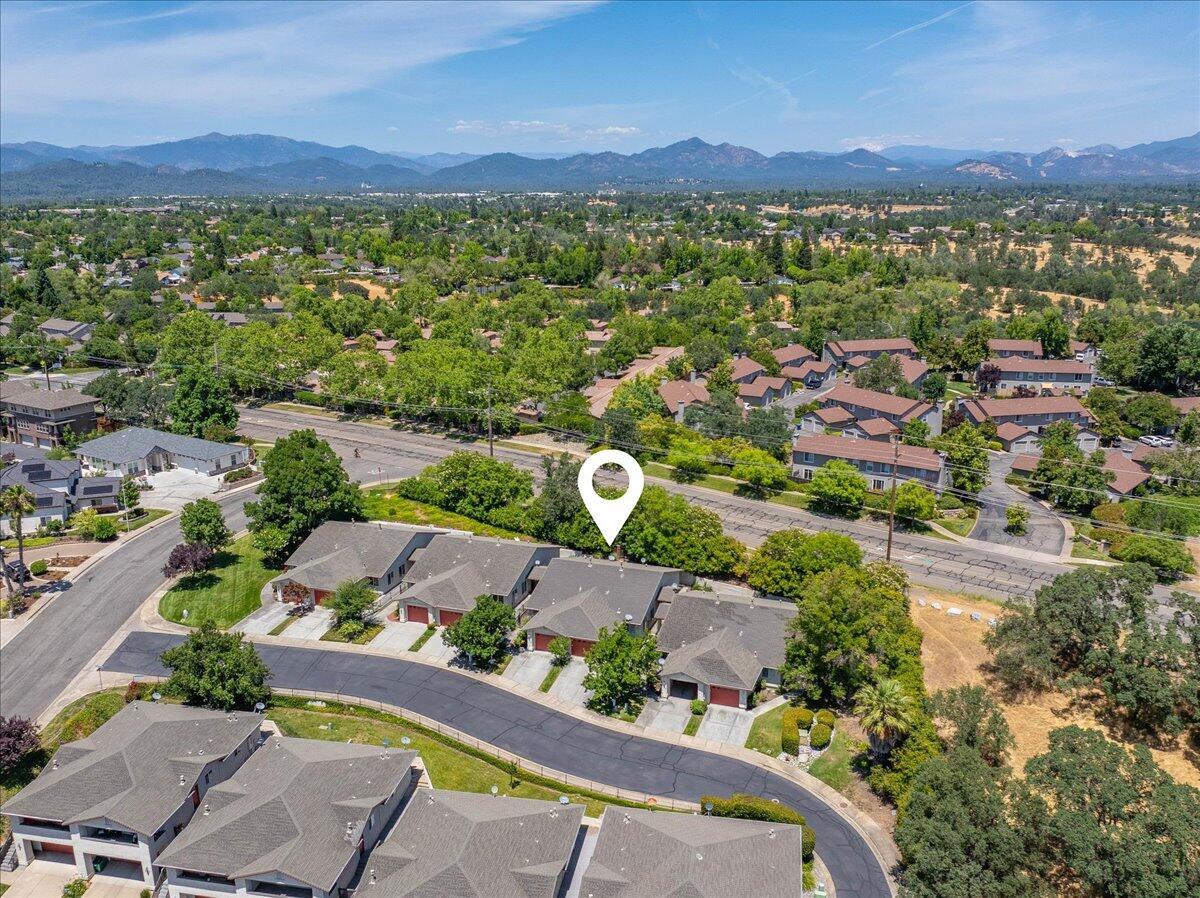 726 Stonebriar Trail Redding, CA 96003 - Photo 2 of 26 an aerial view of a house with a garden