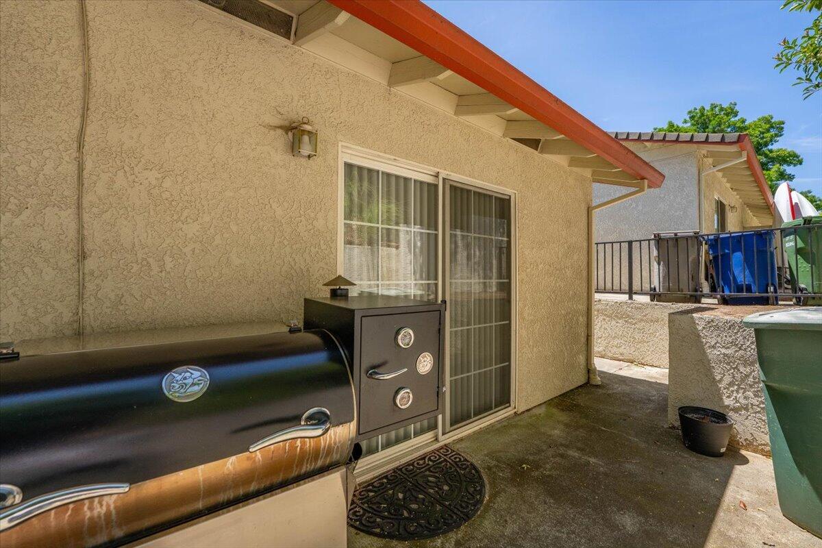 726 Stonebriar Trail Redding, CA 96003 - Photo 21 of 26 a view of livingroom with furniture and windows