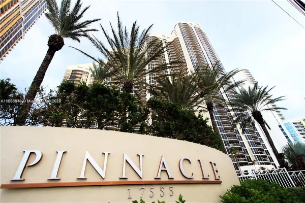 a view of a car parked in front of a house
