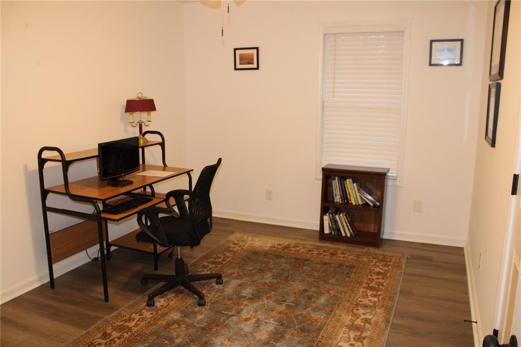 3389 Lochness Lane Powder Springs, GA 30127 - Photo 18 of 48 a view of a workspace with furniture