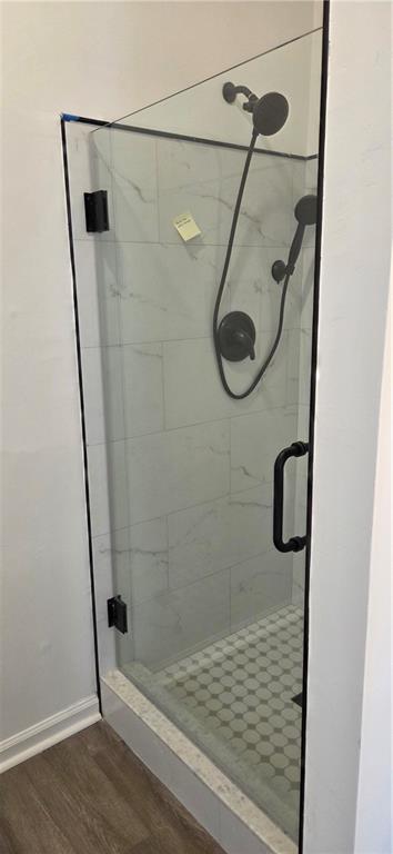 3389 Lochness Lane Powder Springs, GA 30127 - Photo 30 of 48 a bathroom with a shower