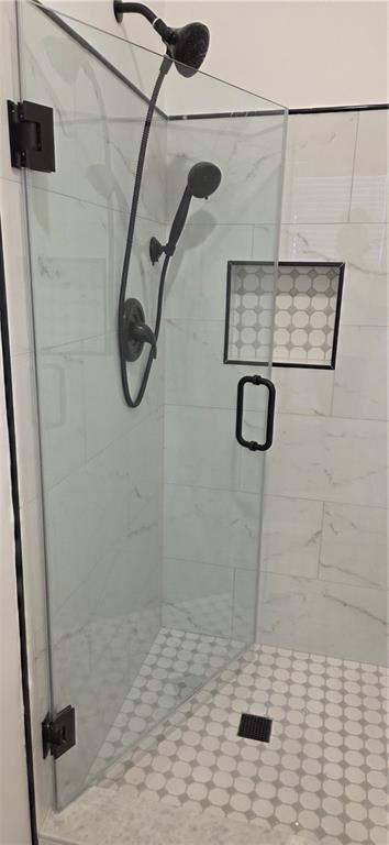 3389 Lochness Lane Powder Springs, GA 30127 - Photo 31 of 48 a bathroom with a shower