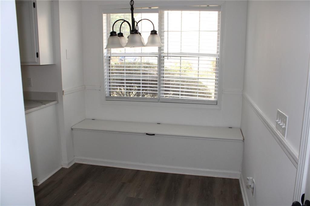 3389 Lochness Lane Powder Springs, GA 30127 - Photo 6 of 48 a view of an empty room with a window