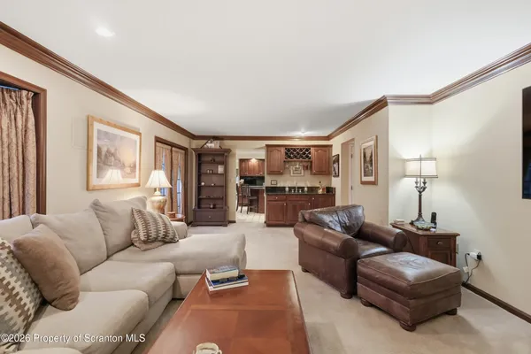 a bedroom with a large bed and furniture