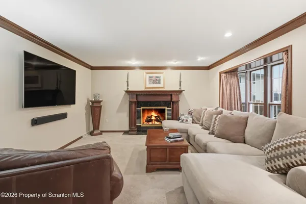 a bathroom with a double vanity sink mirror and shower