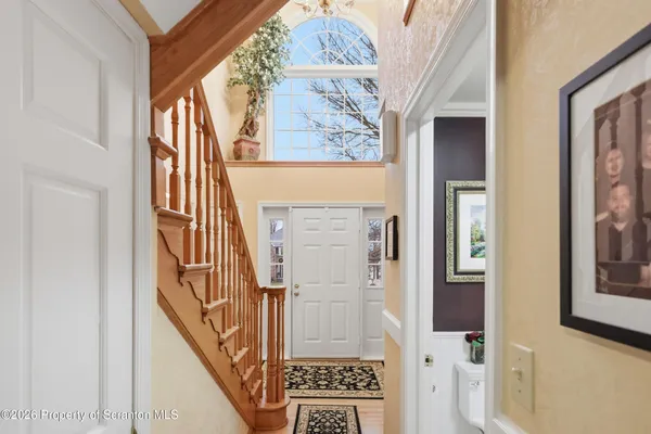 a kitchen with dining table and chairs