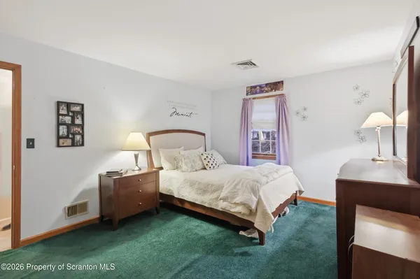 an aerial view of a town with couple of houses