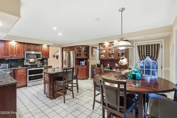 a view of a hallway with staircase