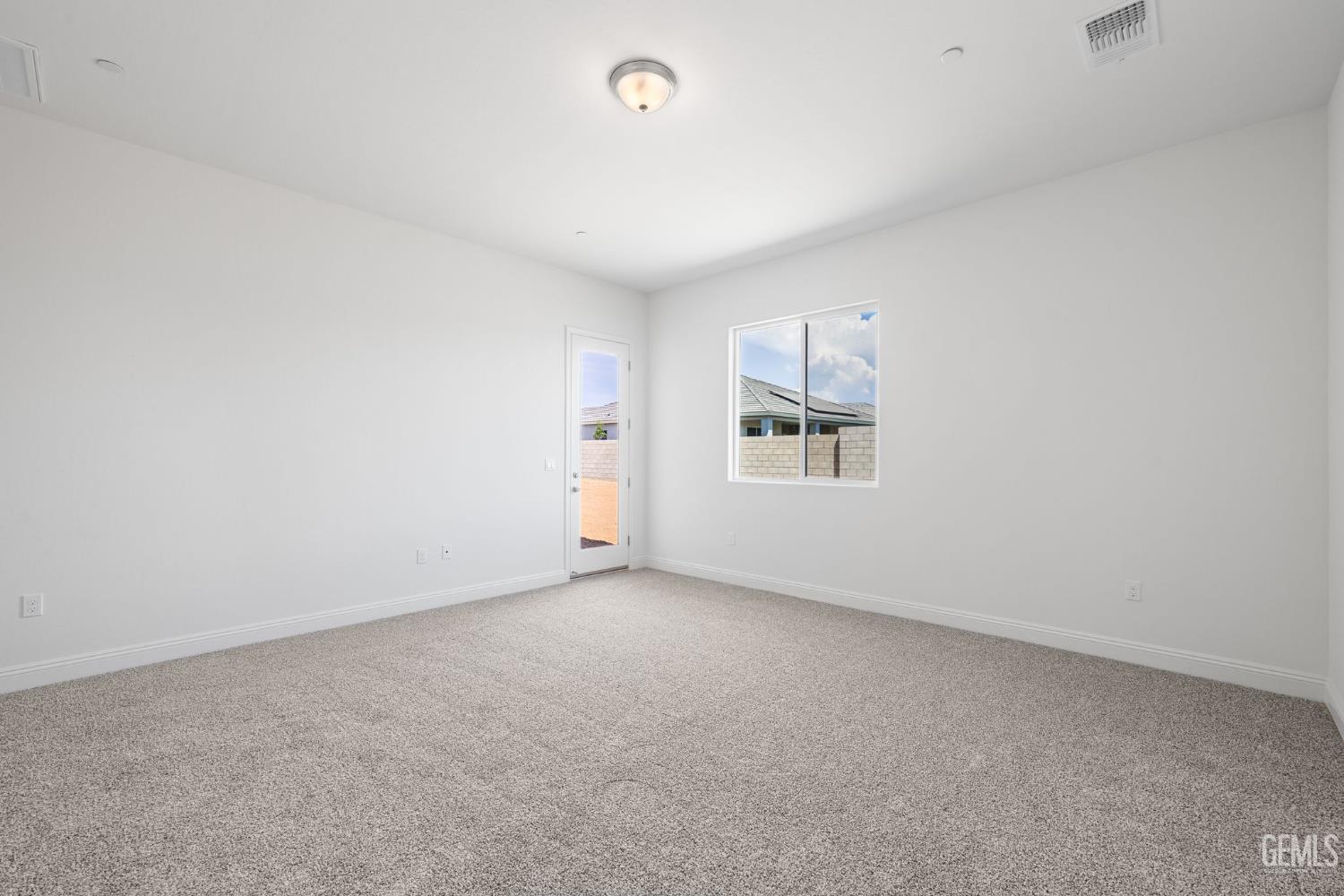 Undisclosed Address Bakersfield, CA 93314 - Photo 25 of 43 an empty room with windows and closet