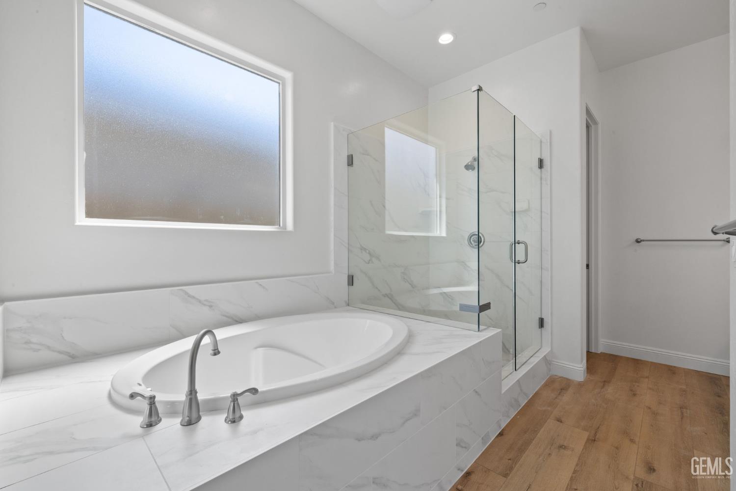 Undisclosed Address Bakersfield, CA 93314 - Photo 29 of 43 a bathroom with a tub and shower