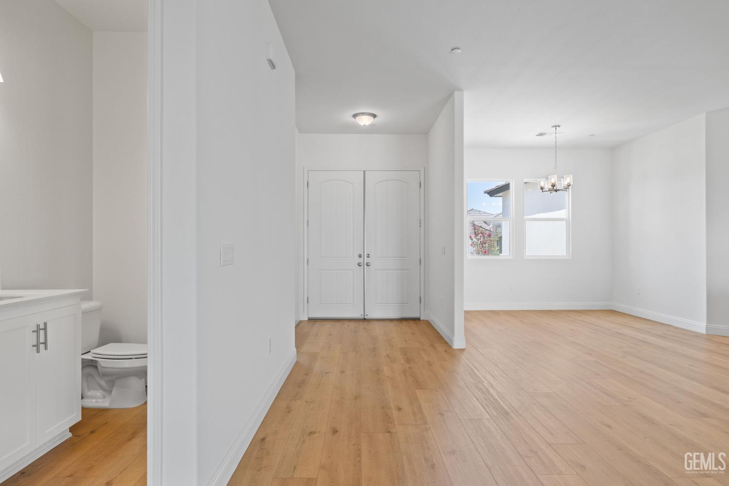 Undisclosed Address Bakersfield, CA 93314 - Photo 3 of 43 a view of livingroom with hardwood