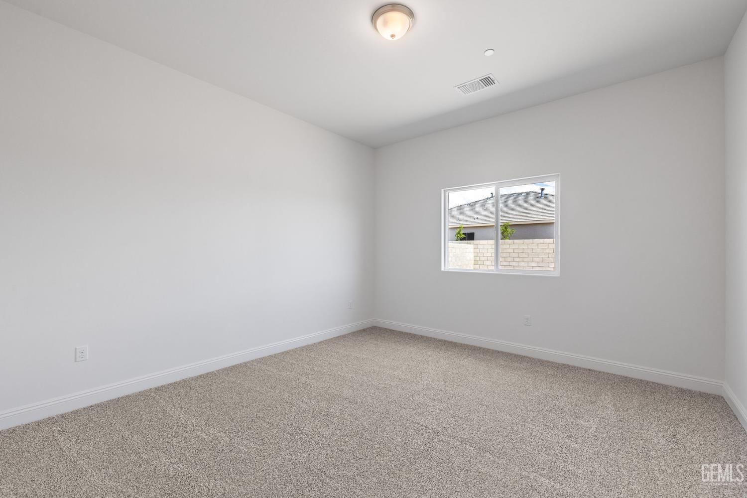 Undisclosed Address Bakersfield, CA 93314 - Photo 33 of 43 an empty room with a window