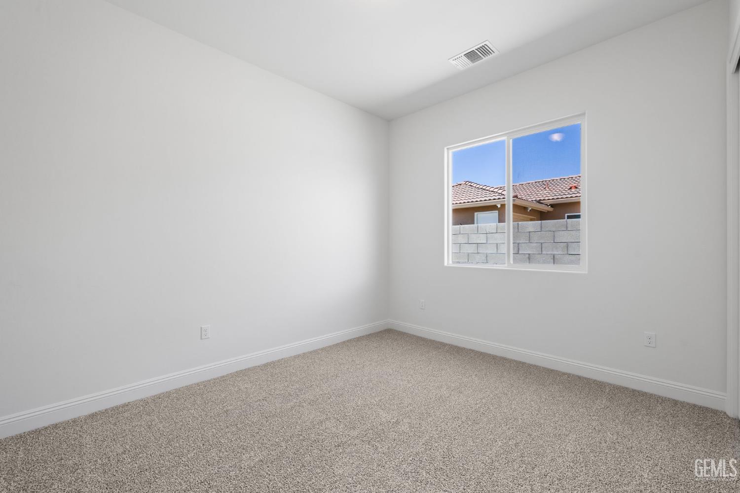 Undisclosed Address Bakersfield, CA 93314 - Photo 37 of 43 an empty room with a window