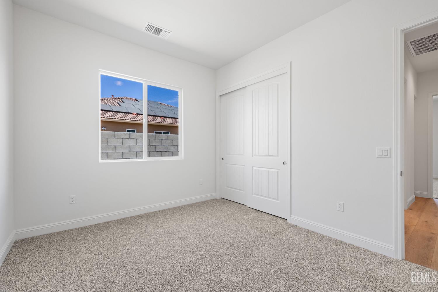 Undisclosed Address Bakersfield, CA 93314 - Photo 38 of 43 a view of an empty room with a window