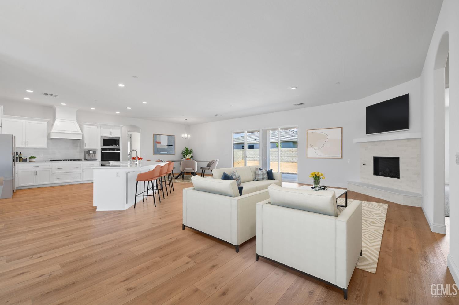 Undisclosed Address Bakersfield, CA 93314 - Photo 4 of 43 a living room with furniture and a flat screen tv