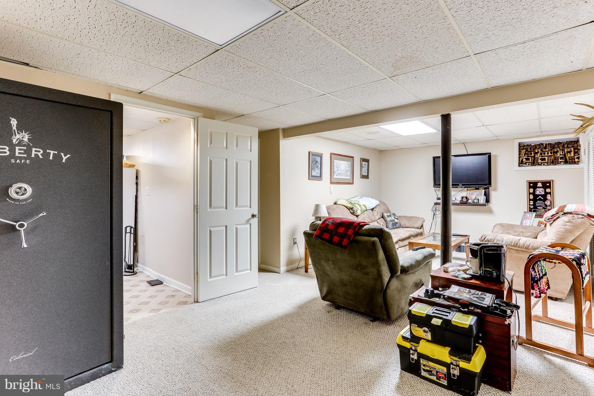 2229 Gablehammer Road Westminster, MD 21157 - Photo 19 of 30 a bedroom with furniture and a flat screen tv
