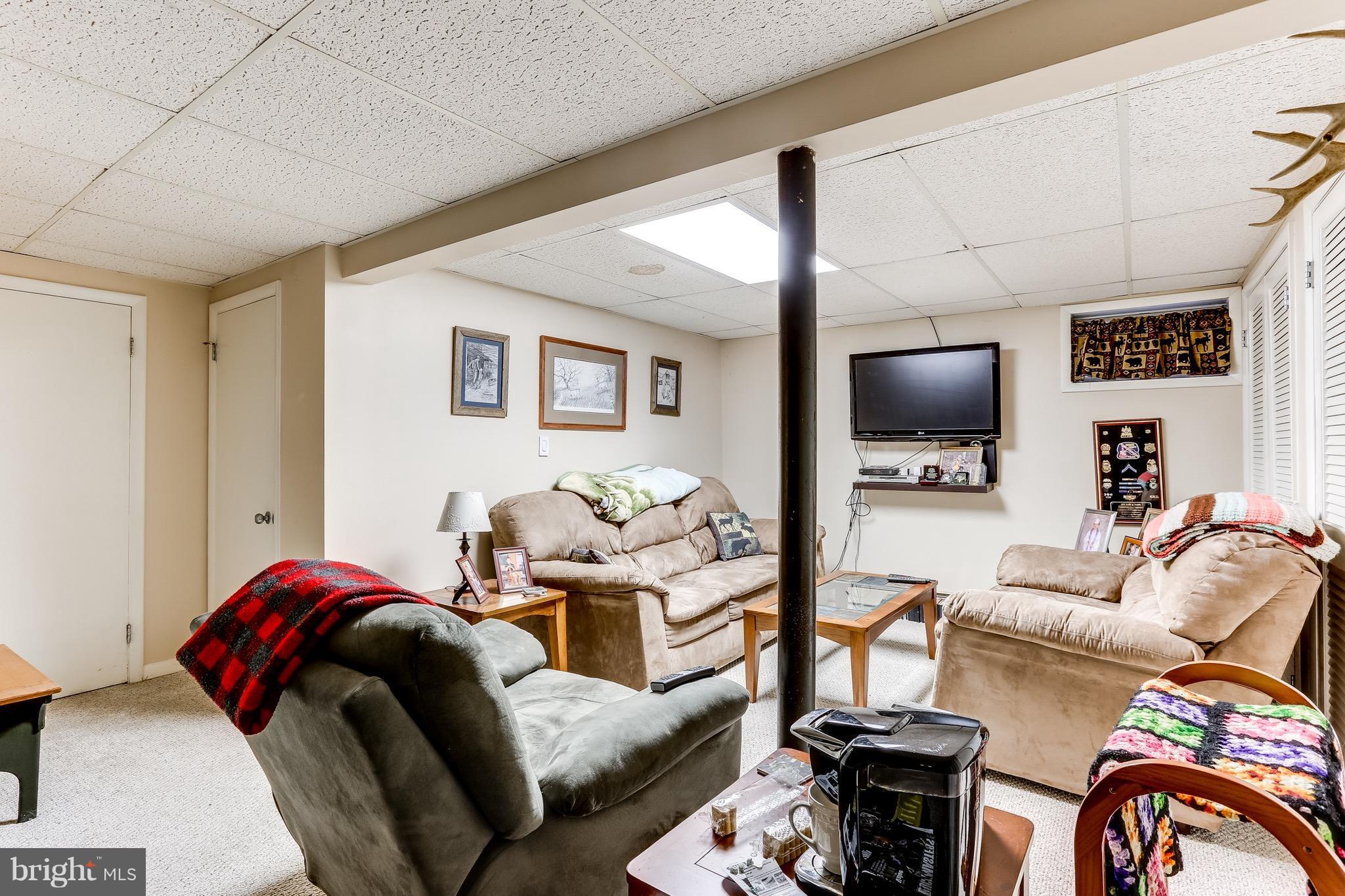 2229 Gablehammer Road Westminster, MD 21157 - Photo 21 of 30 a living room with furniture and a flat screen tv