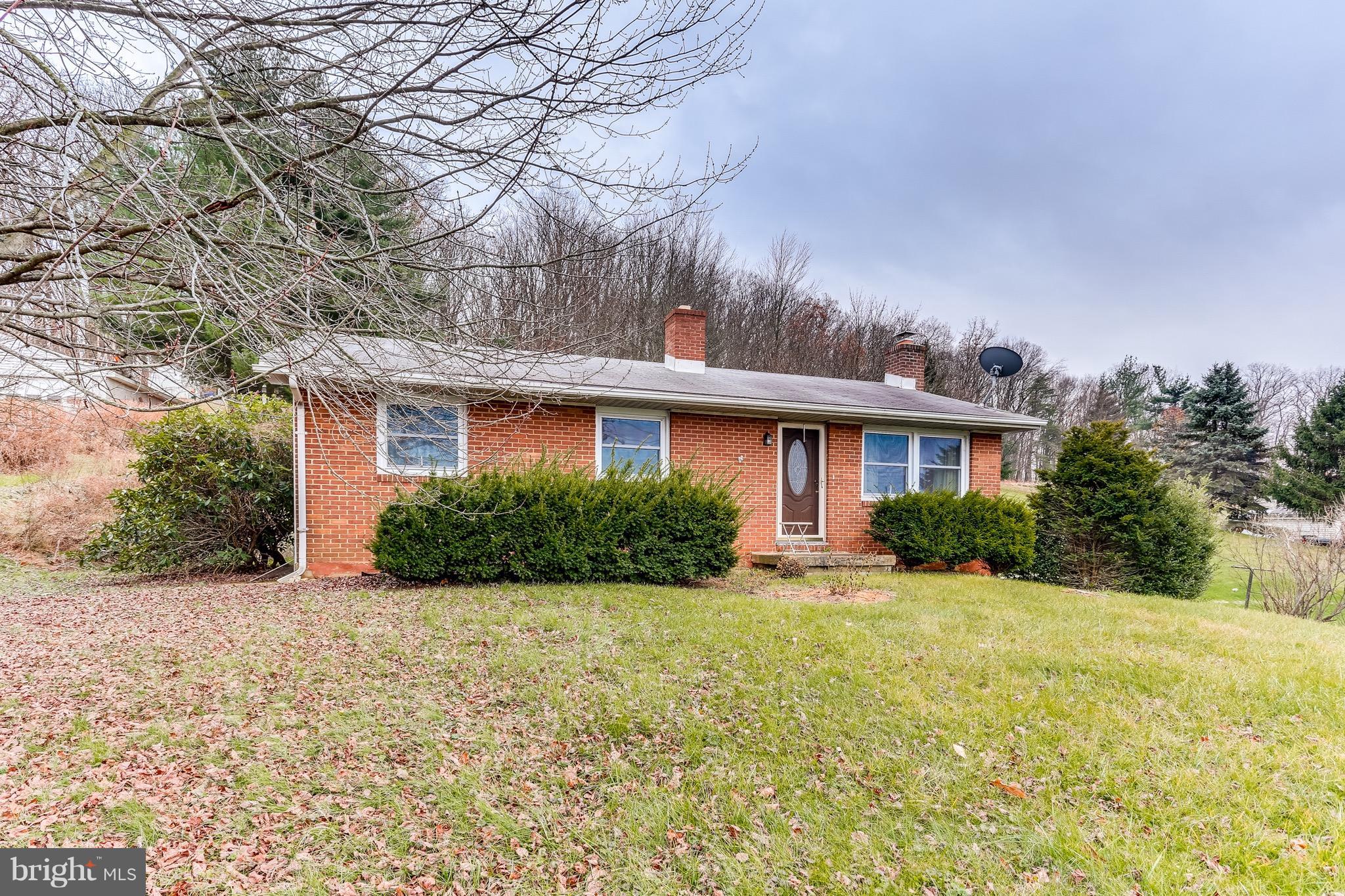 2229 Gablehammer Road Westminster, MD 21157 - Photo 5 of 30 a front view of house with yard and trees around